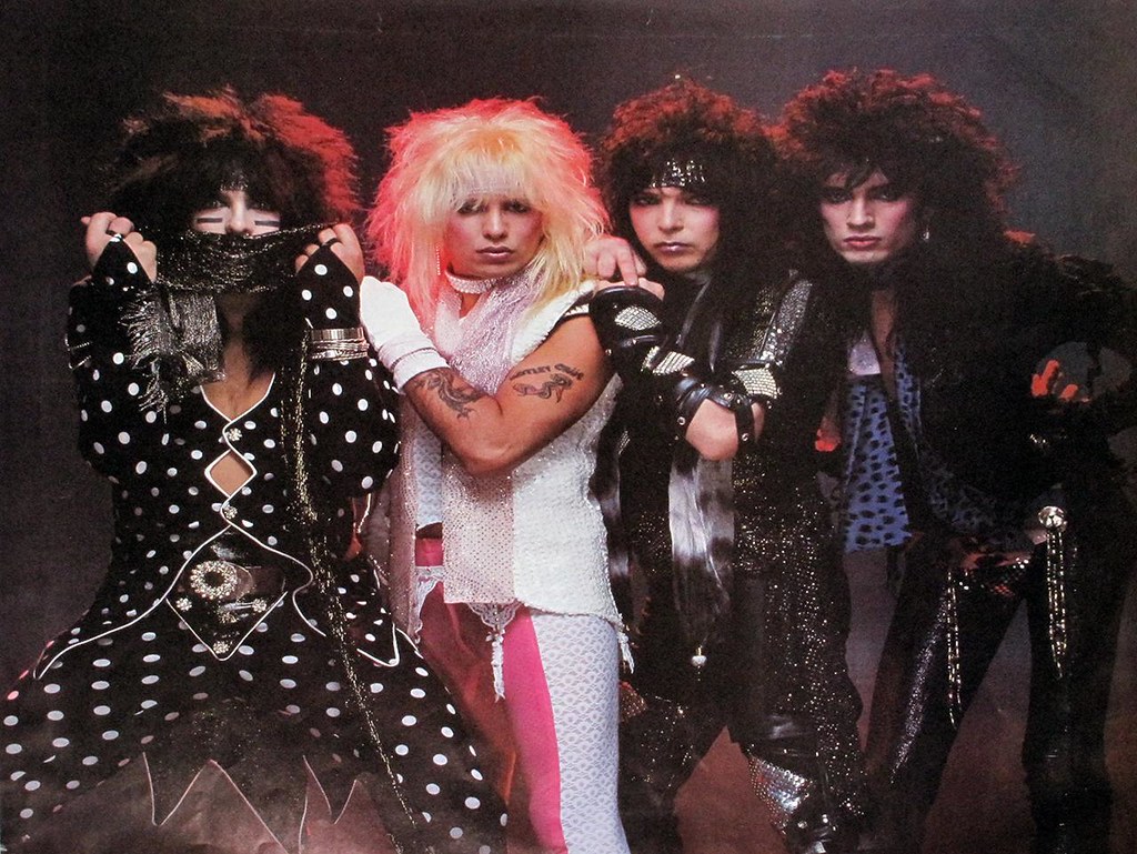 Hair metal band performing live in the 1980s